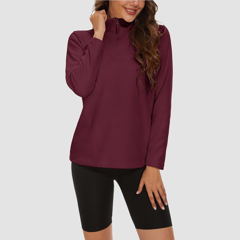 Pile da donna con collo alto e mezza zip