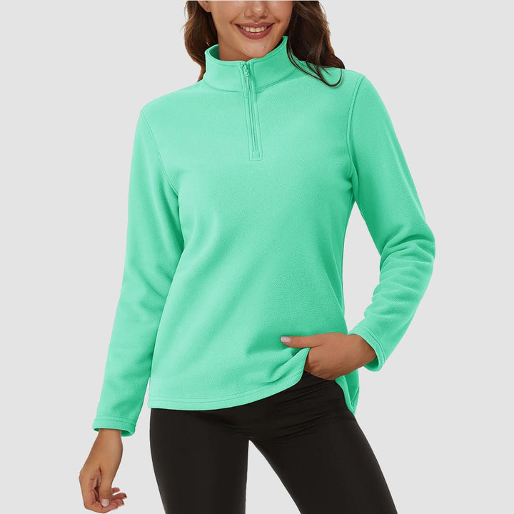 Pile da donna con collo alto e mezza zip