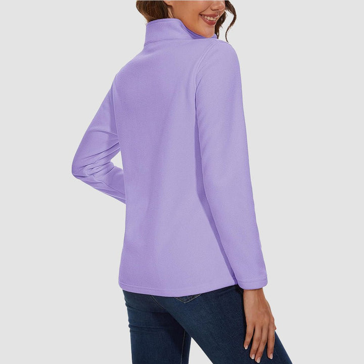Pile da donna con collo alto e mezza zip